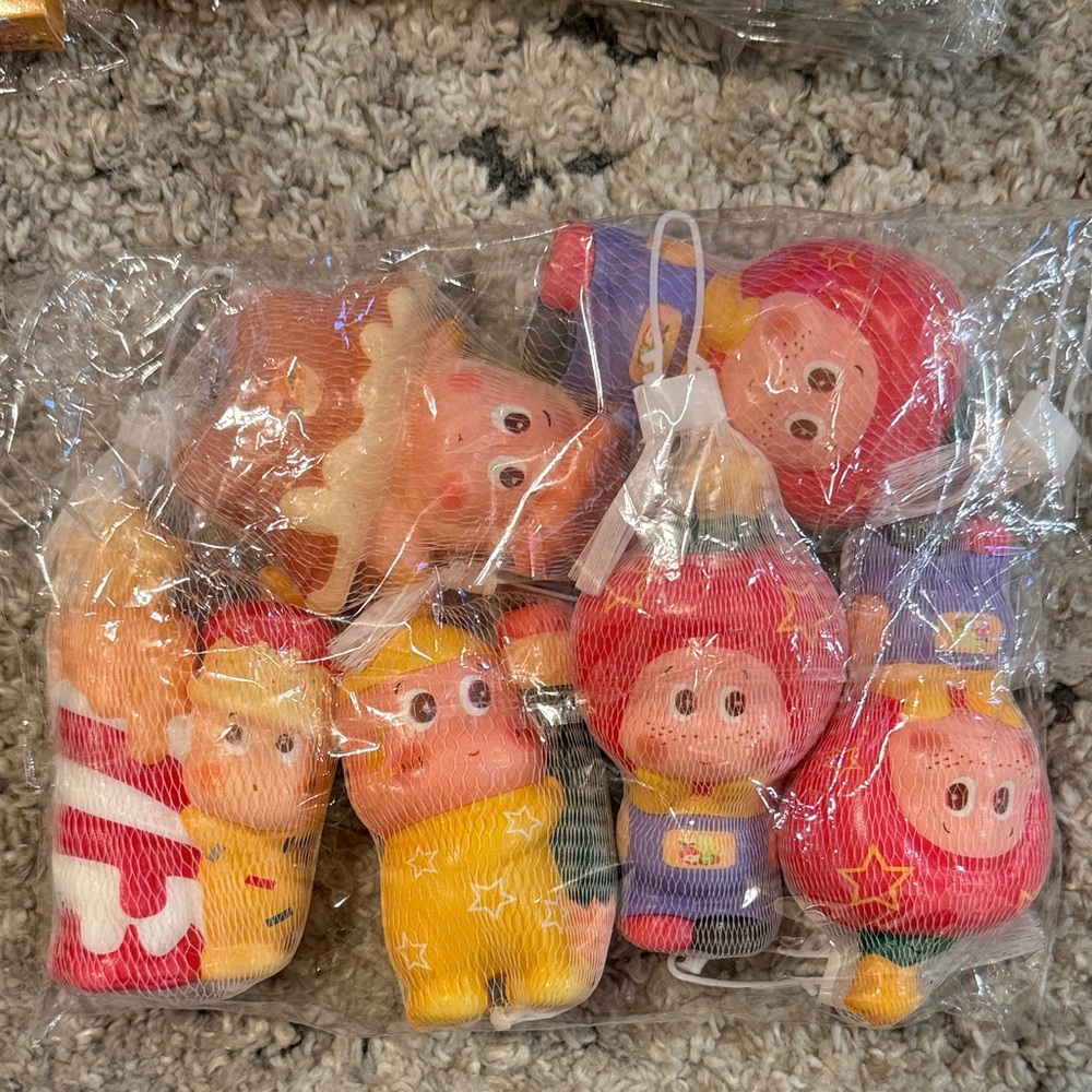 Colorful, fidget “squeezies”. (Set of six).